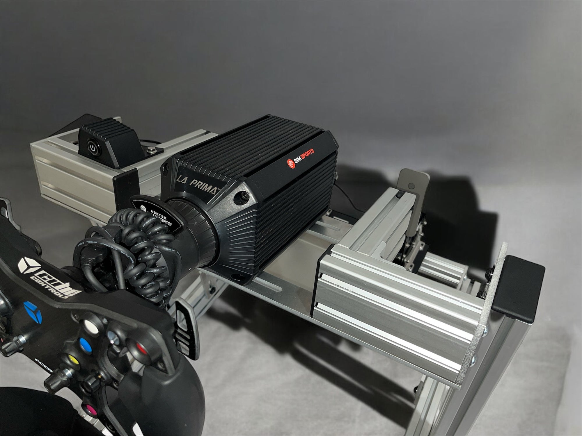 SRP GT100 ELITE racing simulator chassis - premium sim racing cockpit for immersive virtual racing experience, compatible with all major racing wheel brands and designed for stability, comfort, and adjustability.